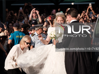 Princess Theodora Glucksburg of Greece and her brother Pavlos, former Crown Prince of Greece, arrive for her wedding with Matthew Jeremiah K...