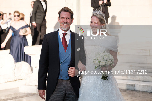 Princess Theodora Glucksburg of Greece and her brother Pavlos, former Crown Prince of Greece, arrive for her wedding with Matthew Jeremiah K...