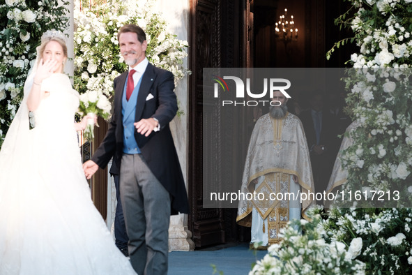 Princess Theodora Glucksburg of Greece and her brother Pavlos, former Crown Prince of Greece, arrive for her wedding with Matthew Jeremiah K...