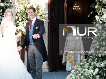 Princess Theodora Glucksburg of Greece and her brother Pavlos, former Crown Prince of Greece, arrive for her wedding with Matthew Jeremiah K...