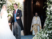 Princess Theodora Glucksburg of Greece and her brother Pavlos, former Crown Prince of Greece, arrive for her wedding with Matthew Jeremiah K...