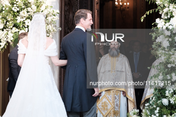 Princess Theodora Glucksburg of Greece and her brother Pavlos, former Crown Prince of Greece, arrive for her wedding with Matthew Jeremiah K...