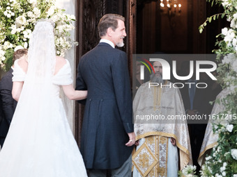 Princess Theodora Glucksburg of Greece and her brother Pavlos, former Crown Prince of Greece, arrive for her wedding with Matthew Jeremiah K...