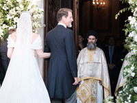 Princess Theodora Glucksburg of Greece and her brother Pavlos, former Crown Prince of Greece, arrive for her wedding with Matthew Jeremiah K...