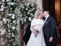 Princess Theodora Glucksburg of Greece and Matthew Jeremiah Kumar kiss each other after their wedding at the Metropolitan Cathedral in Athen...