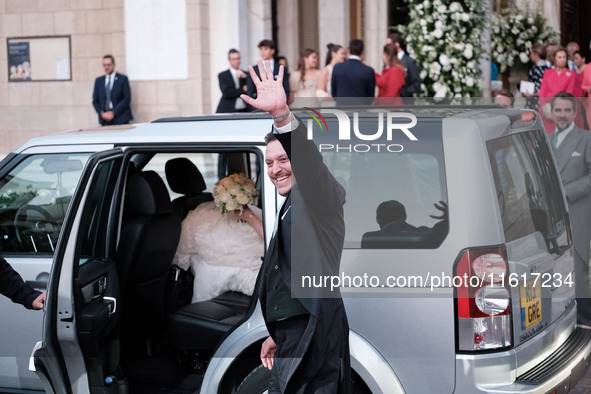 Matthew Jeremiah Kumar greets after his wedding with Princess Theodora Glucksburg at the Metropolitan Cathedral of Athens in Athens, Greece,...