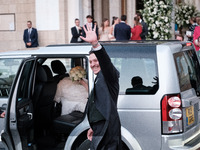 Matthew Jeremiah Kumar greets after his wedding with Princess Theodora Glucksburg at the Metropolitan Cathedral of Athens in Athens, Greece,...