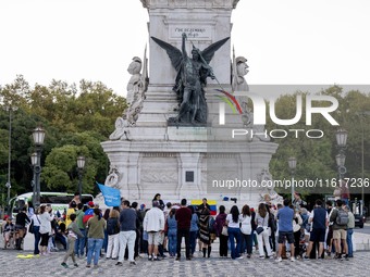 Several activists rally during a demonstration in Restauradores Square in Lisbon, Portugal, on September 28, 2024, as a result of the allege...