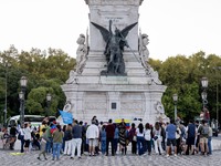 Several activists rally during a demonstration in Restauradores Square in Lisbon, Portugal, on September 28, 2024, as a result of the allege...