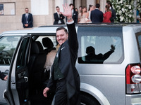 Matthew Jeremiah Kumar greets after his wedding with Princess Theodora Glucksburg at the Metropolitan Cathedral of Athens in Athens, Greece,...