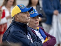 Several people wearing caps with the Venezuelan flag gather during a demonstration at Restauradores Square in Lisbon, Portugal, on September...