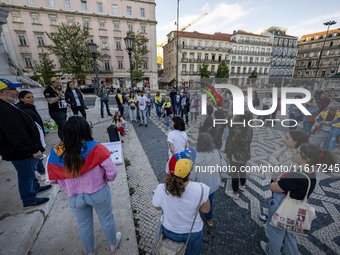 Several activists rally during a demonstration in Restauradores Square in Lisbon, Portugal, on September 28, 2024, as a result of the allege...