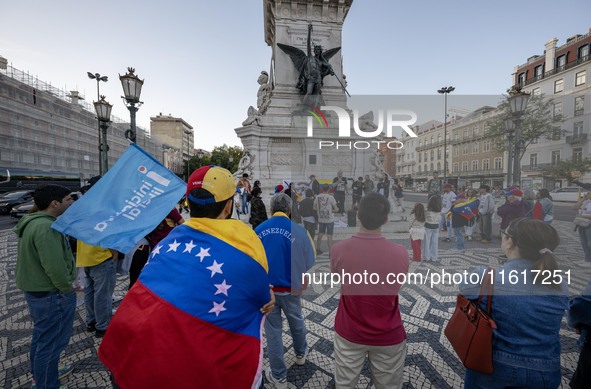 Several activists rally during a demonstration in Restauradores Square in Lisbon, Portugal, on September 28, 2024, as a result of the allege...