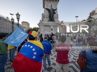 Several activists rally during a demonstration in Restauradores Square in Lisbon, Portugal, on September 28, 2024, as a result of the allege...