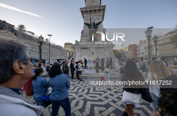 Several activists rally during a demonstration in Restauradores Square in Lisbon, Portugal, on September 28, 2024, as a result of the allege...