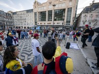 Several activists rally during a demonstration in Restauradores Square in Lisbon, Portugal, on September 28, 2024, as a result of the allege...