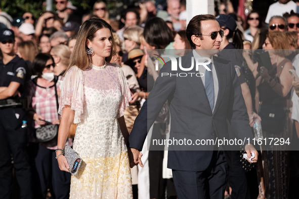 Guests arrive for the wedding of Princess Theodora Glucksburg of Greece and Matthew Jeremiah Kumar at the Metropolitan Cathedral of Athens,...