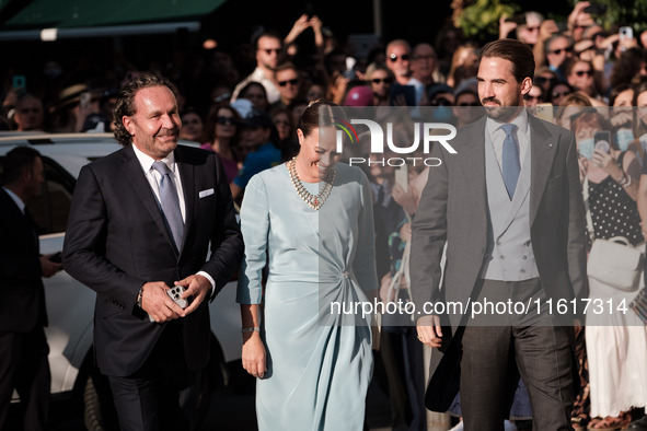 Philippos, son of former King of Greece Constantine II, and his wife Nina Flohn arrive for the wedding of Princess Theodora Glucksburg of Gr...