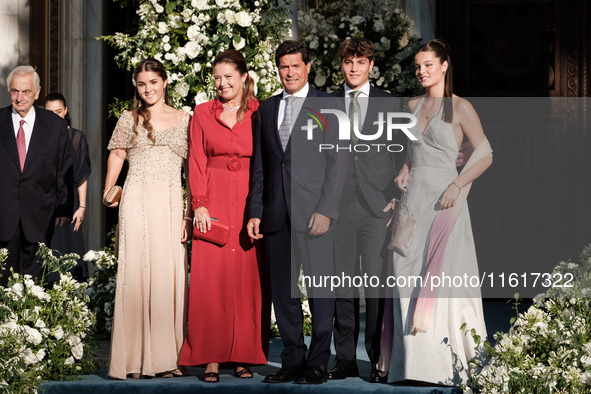 Alexia of Greece and Carlos Morales with their children, Ana Maria, Amalia, and Carlos arrive for the wedding of Princess Theodora Glucksbur...