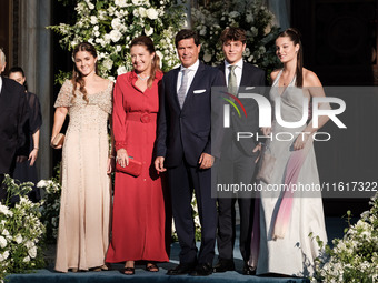 Alexia of Greece and Carlos Morales with their children, Ana Maria, Amalia, and Carlos arrive for the wedding of Princess Theodora Glucksbur...