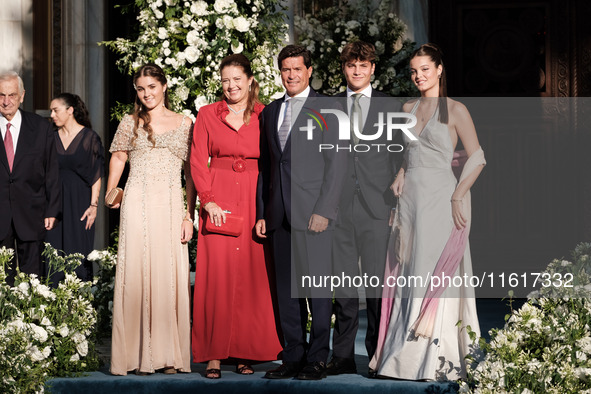 Alexia of Greece and Carlos Morales with their children, Ana Maria, Amalia, and Carlos arrive for the wedding of Princess Theodora Glucksbur...