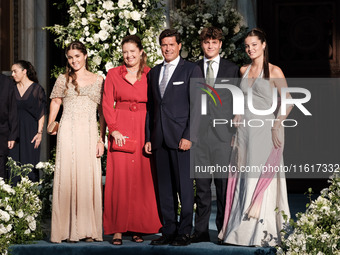 Alexia of Greece and Carlos Morales with their children, Ana Maria, Amalia, and Carlos arrive for the wedding of Princess Theodora Glucksbur...