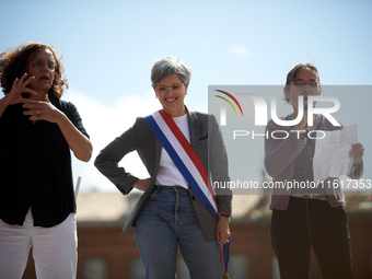 Sandrine Rousseau, French MP, stands between two women during the International Safe Abortion Day. For the International Safe Abortion Day,...