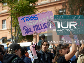 People hold signs reading 'Transparenthood by thousands' and 'let us do abortion as we want'. For International Safe Abortion Day, hundreds...