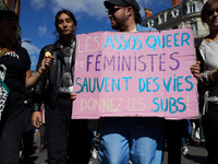 Someone holds a cardboard sign reading 'Feminist and queer associations save lives'. For International Safe Abortion Day, hundreds of women...