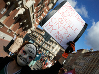 A person in the march holds a placard reading 'Without right it's needles or hanger'. For International Safe Abortion Day, hundreds of women...