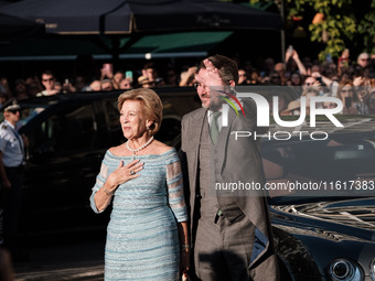 Anne Marie of Denmark and her son, Nicholas of Greece, attend the wedding of Princess Theodora Glucksburg of Greece and Matthew Jeremiah Kum...