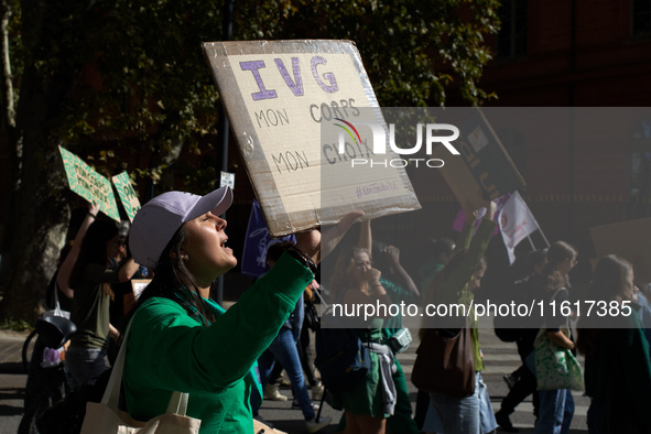 A woman shouts while holding a placard reading 'Abortion, my body, my choice'. For International Safe Abortion Day, hundreds of women and me...