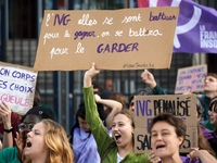 A young woman holds a placard reading 'Abortion they fought for it, we'll fight to keep it'. For International Safe Abortion Day, hundreds o...