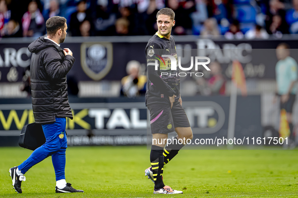 PSV Eindhoven midfielder Joey Veerman gets injured during the match between Willem II and PSV at the Koning Willem II stadium for the Dutch...