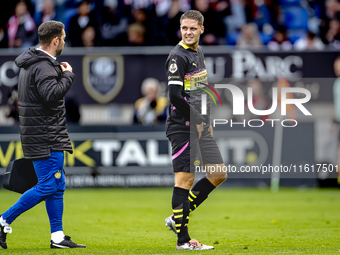 PSV Eindhoven midfielder Joey Veerman gets injured during the match between Willem II and PSV at the Koning Willem II stadium for the Dutch...