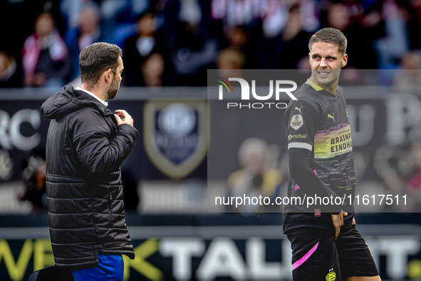 PSV Eindhoven midfielder Joey Veerman gets injured during the match between Willem II and PSV at the Koning Willem II stadium for the Dutch...