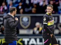 PSV Eindhoven midfielder Joey Veerman gets injured during the match between Willem II and PSV at the Koning Willem II stadium for the Dutch...