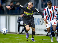 PSV Eindhoven defender Rick Karsdorp and Willem II forward Amar Fatah during the match Willem II vs. PSV at the Koning Willem II stadium for...