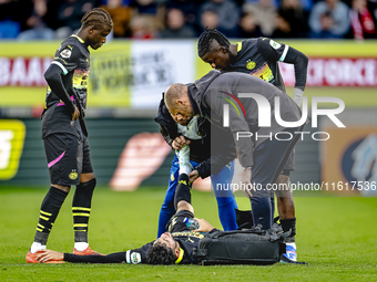 PSV Eindhoven forward Ricardo Pepi gets injured during the match between Willem II and PSV at the Koning Willem II stadium for the Dutch Ere...