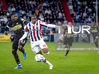 PSV Eindhoven forward Johan Bakayoko and Willem II forward Amar Fatah during the match Willem II vs. PSV at the Koning Willem II stadium for...