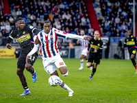 PSV Eindhoven forward Johan Bakayoko and Willem II forward Amar Fatah during the match Willem II vs. PSV at the Koning Willem II stadium for...