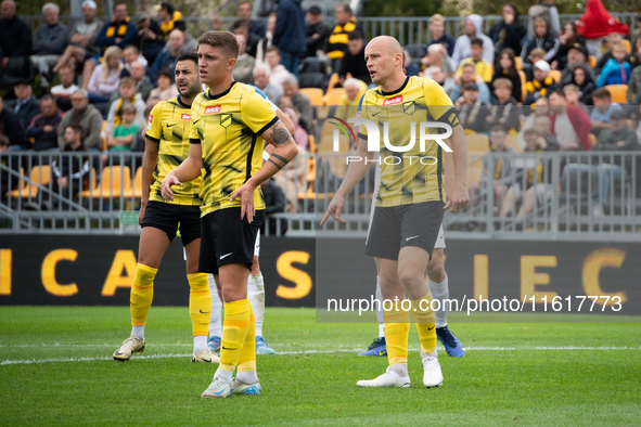 Michal Pazdan, Michal Trabka, and Manuel Torres play during the game between Wieczysta Krakow and Skra Czestochowa in Krakow, Poland, on Sep...