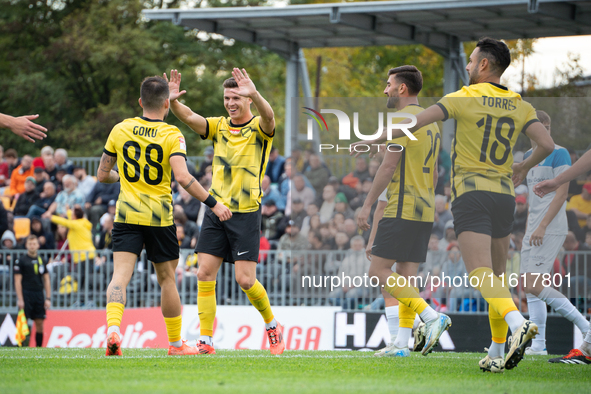 Wieczysta players celebrate scoring a goal during the game between Wieczysta Krakow and Skra Czestochowa in Krakow, Poland, on September 28,...