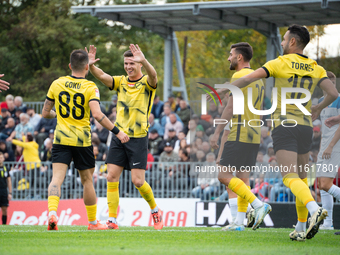 Wieczysta players celebrate scoring a goal during the game between Wieczysta Krakow and Skra Czestochowa in Krakow, Poland, on September 28,...