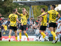 Wieczysta players celebrate scoring a goal during the game between Wieczysta Krakow and Skra Czestochowa in Krakow, Poland, on September 28,...