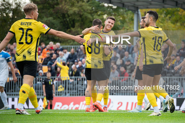 Wieczysta players celebrate scoring a goal during the game between Wieczysta Krakow and Skra Czestochowa in Krakow, Poland, on September 28,...