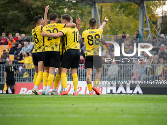 Wieczysta players celebrate scoring a goal during the game between Wieczysta Krakow and Skra Czestochowa in Krakow, Poland, on September 28,...