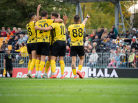 Wieczysta players celebrate scoring a goal during the game between Wieczysta Krakow and Skra Czestochowa in Krakow, Poland, on September 28,...