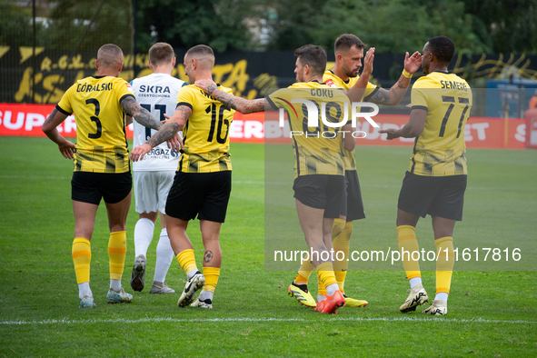 Wieczysta players celebrate scoring a goal during the game between Wieczysta Krakow and Skra Czestochowa in Krakow, Poland, on September 28,...