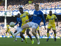 Jarrad Branthwaite #32 of Everton F.C clears the area during the Premier League match between Everton and Crystal Palace at Goodison Park in...